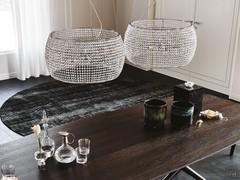 Pair of Kidal pendant lamps to illuminate an Atrium table top