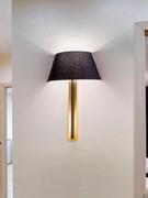 Band wall lamp, again with characteristic black or white fabric shade