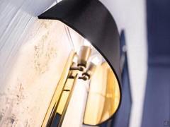 Detail of the shade on the wall version of the Band lamp, with two E14 lamp holders for diffuse light on the wall behind