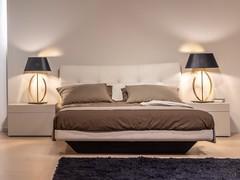 Lamp with gold ring Band in the bedroom, standing on two bedside tables