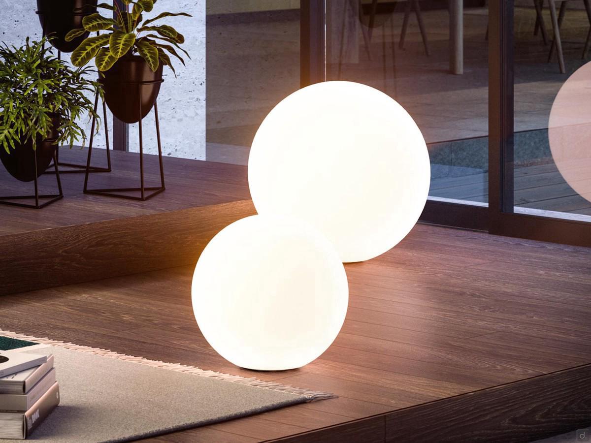 Modern ball-shaped lamp OH! in the floor-standing version, here proposed in a pleasant composition with very different diameters
