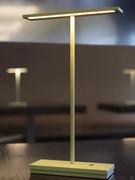 Dubcolor LED desk lamp, here proposed in the Pantone green colour variant. Note how the colour temperature of the LED can change the shade of the frame and diffuser