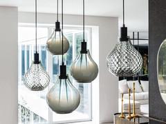 Aladdin art glass pendant lamp by Cattelan, with the three-dimensional textured glass balloton effect version in the foreground