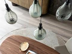 Top view of the Aladdin pendant lamp in a customised 4-element configuration: two in white smoked glass, two in balloton glass