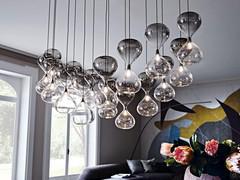 Sablier lamp realised in compositions of several elements - lampshade in transparent glass or smoked glass. Compositions can be realised by combining several individual elements, or by opting for models with 12 or 24 lampshades
