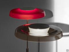 Detail of the retro-style loudspeakers in double smoked and sandblasted red finish