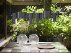 The lampshade colour can be customised, available in matte black or glossy grey