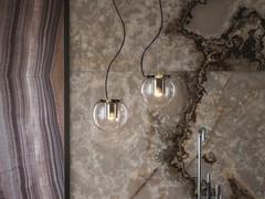 A pair of The Globe pendant lamps, available in two measurements with 300 cm maximum cable length