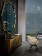 Designer mirror Emerald by Cattelan large reflective surface enclosed by shaped frame 