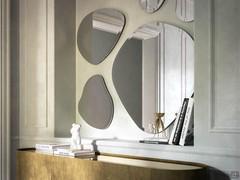 Hawaii asymmetric mirror with bevelled frame by Cattelan, with which it is possible to create large irregular full-wall compositions