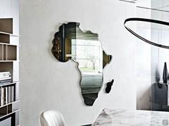 Africa mirror by Cattelan, available smoked or bronzed, always with irregular bevelled edges