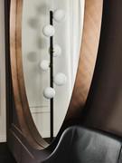 Detail of the Wish round mirror frame by Cattelan