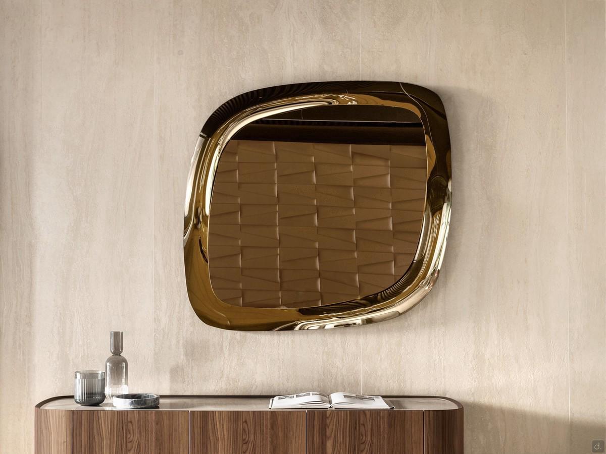 Platinum framed wall mirror in the bronze version above the Lena sideboard