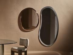 Composition of Liquid mirrors with the smaller format cm 100 x 87 on the left, the vertical format cm 90 x 180 on the right