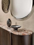 Glimpse of the detail of the mirrored frames also reflecting the surroundings