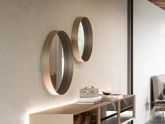 Two Cincinnati mirrors with 60 and 75 cm diameters. We see the eye-catching lacquered metal frame with an 8 cm depth