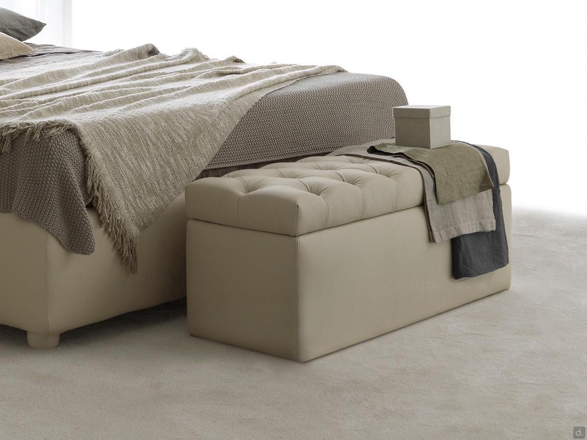 Edison is a rectangular storage pouffe with tufted seat