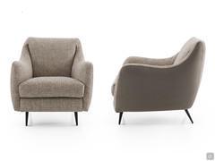 Front and side view of the Jolie outlet armchair with its harmonious and enveloping shapes