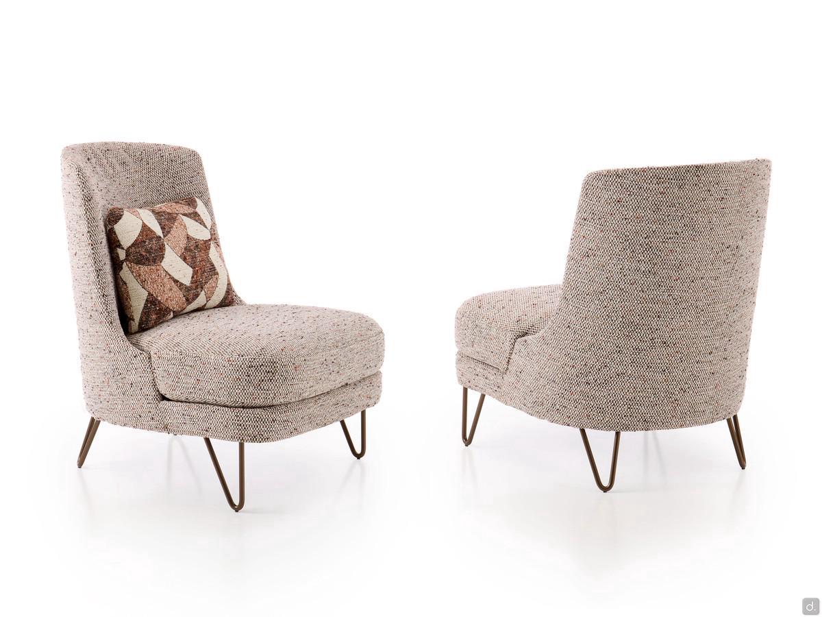 Beatrix outlet armchair with metal hairpin feet covered in Chanel fabric with matching patterned cushion