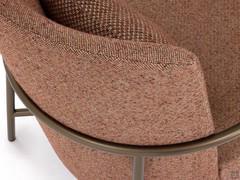 Detail of the rounded backrest supported at the rear by the bronzed tubular profile that emphasises its curvature