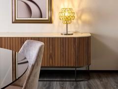 Gentle, curved shapes for the refined design of the Dune outlet sideboard (lamp not included in the offer)