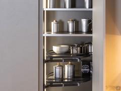 Interior of corner pantry equipped with pull-out shelves
