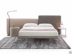 Front view of the Cooper outlet double bed with boiserie-effect upholstered headboards and matching Heliodoro and Diaspro bedside tables