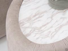 Detail of the Diaspro outlet bedside table top in polished gold Calacatta marble