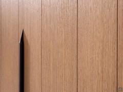 Detail of the processing of the Land Player cabinet doors, a slight milling that makes it unique and recognisable