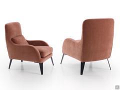 Mabel outlet armchair with shaped armrests and high, slender feet 