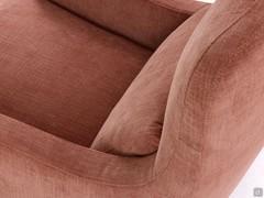 Detail view showing the sinuous profile of the armrest and backrest