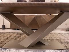 Detail of GFM11 titanium embossed metal cross-base