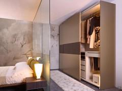 Pacific Vermont outlet two-door sliding wardrobe in Palladium matt lacquer finish with central band in Cuba oak