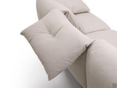 The back cushions can also be folded down. Note the buttons to match the upholstery