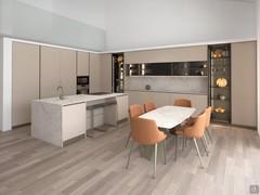 Large corner kitchen composition with working island. Area complete with table and chairs.