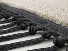 Detail of the fringes with knob
