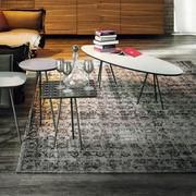 Mapoon faded rug by Cattelan with Kaos coffee tables