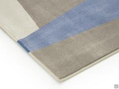 Detail of carpet Alicante in shades of gray with light blue accent and tone-on-tone border
