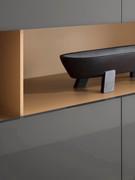 Elegant contrast of colour between the open compartment and the lacquered structure