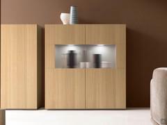 Start cupboard with hinged doors and display case in the middle. Glass doors with groove finish.