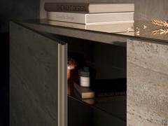 Construction detail of the doors: note the embossed titanium aluminium frame profiled in such a way as to facilitate grip when opening, and the thickness of the KM21 Colosseo ceramic slab only 6 mm thick