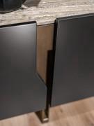 Detail of the metal inserts of the Mirage sideboard, here proposed in light patinated BQCH bronze