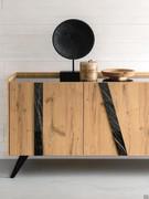 Detail of the ceramic inserts on the doors of the Pilar sideboard, which can also be configured in metal. It is also possible to choose a more 'classic' and rustic version with only wooden fronts without inserts