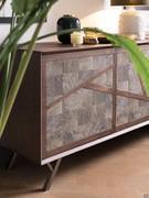 Detail showing the structure of the sideboard in coffee oak with 45° machined edges and corners. The legs are the Branch version h.20 cm in lacquered brass metal