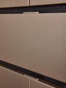 Detail of the Raiki sideboard fronts, with central inserts matching the plinth and Minimal handles