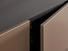 Detail of the Palladio matt lacquered hinged compartment and the wooden top laminated with Mirror Dark