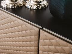 Detail of the quilted work on the Absolut sideboard doors, covered in imitation or real leather