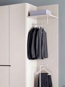 Hanging rods and top shelf in matte lacquer to match the frame