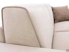 Detail of the fabric upholstery with matching piping 