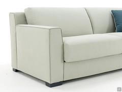 Detail of the armrest and the high backrest on which the back cushions rest